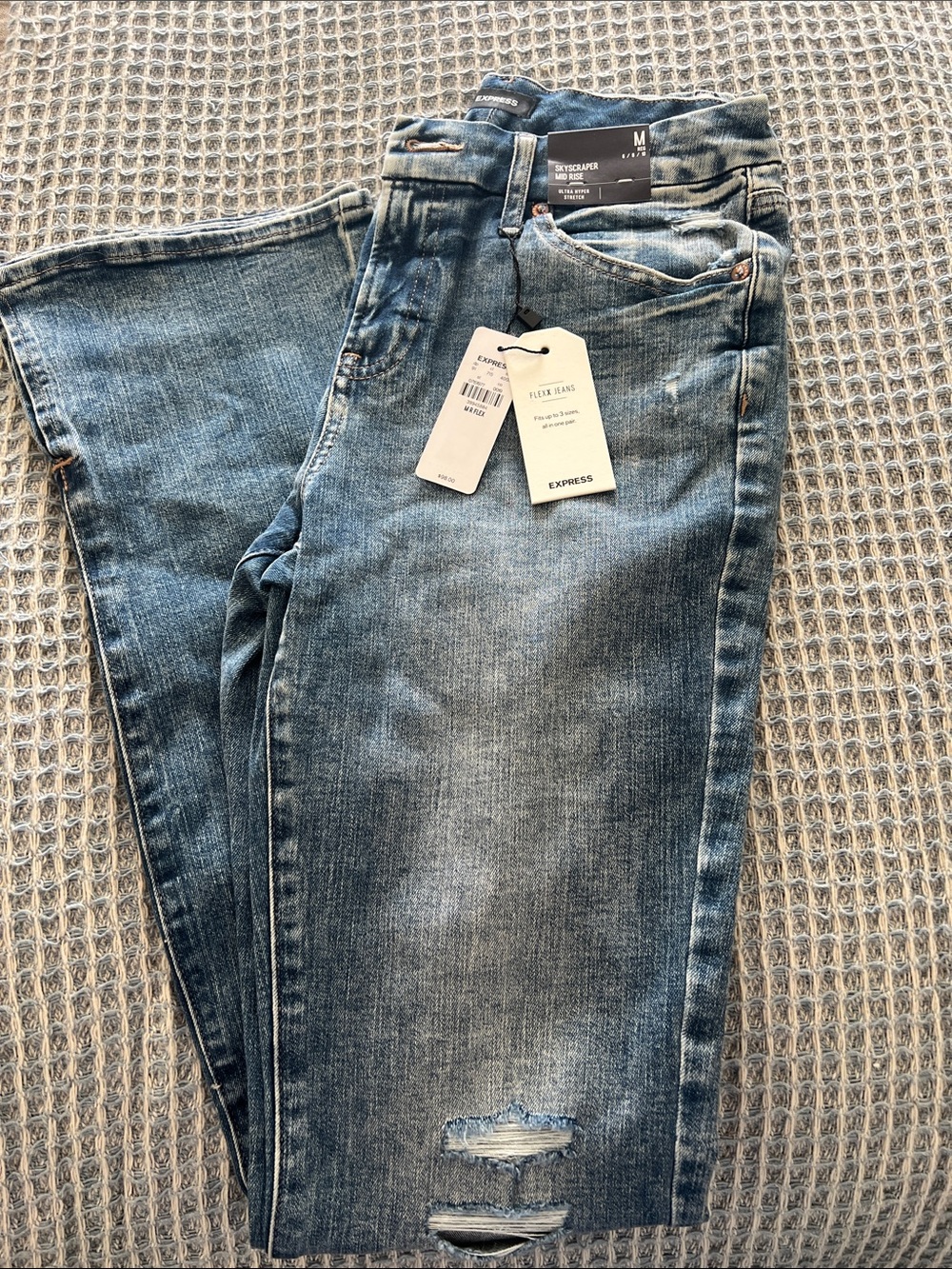Express Women’s Skyscraper Jeans in Faded Blue Denim